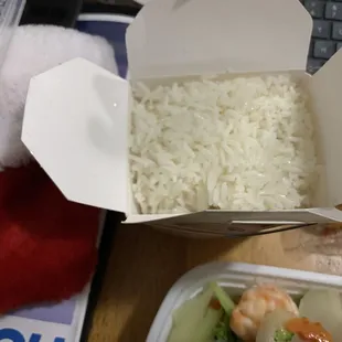 a box of rice and vegetables