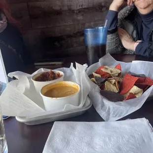 Queso cheese and salsa with chips. Perfect appetizer...