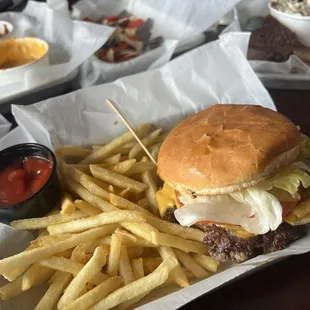 Classic cheese burger and awesome shoe string fries. All were prepared excellently and the flavor was awesome as well as fresh.