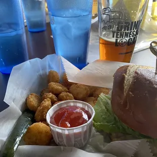 Pretzel burger with potato bites