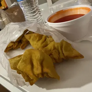 Cheese wontons with sauce