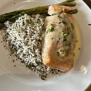 Stuffed salmon on a bed of quinoa &amp; basmati rice, with a side of sautéed asparagus!