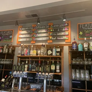 a bar with a variety of liquors