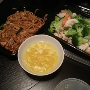 Chicken lo mein, steamed chicken with mixed veggies &amp; egg drop soup.