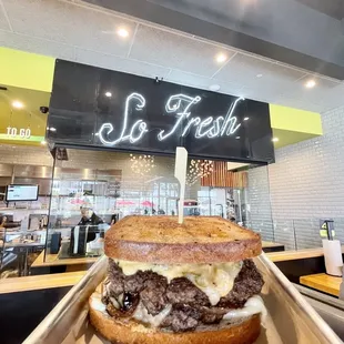 Doddy Melt  Double Smashed Beef Patties, Swiss &amp; American Cheese, Griddled Umami Onions, Mayo &amp; Comeback Sauce on Toasted Rye Bread.