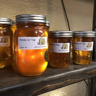 jars of honey on a shelf