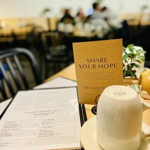 a cup of coffee and menu