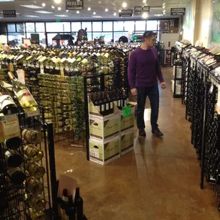 Man dressed as a grape mourning his fallen comrades. They did not die in vine-I mean vain.