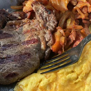 Steak and eggs with home fries