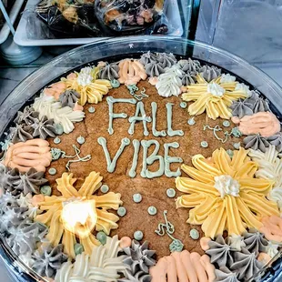 a cake with the words fall vibe written on it