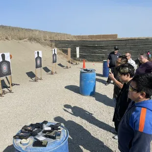 Class lined up going over basic safety&apos;s and rules for shooting line.