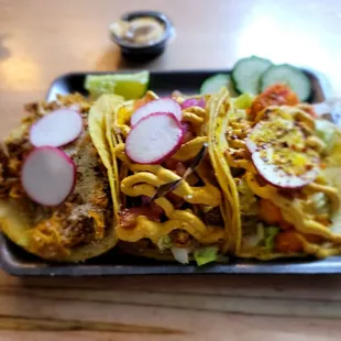Shrimp, guera, chicken Tikka tacos