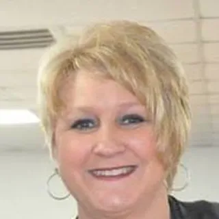 Sandi M.