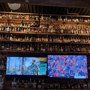 a wall full of liquor bottles