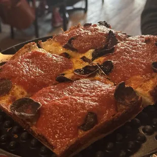 a slice of pizza on a pan