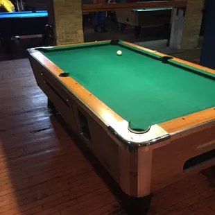 A number of pool tables found here.