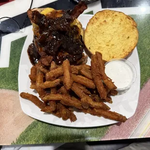 Whiskey barbecue chicken sandwich with beer battered fries and a side of ranch