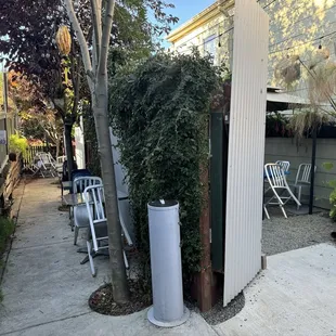Shady outdoor seating in the side yard areas