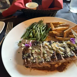 Coffee rubbed New York strip with green beans and scrumptious fries.