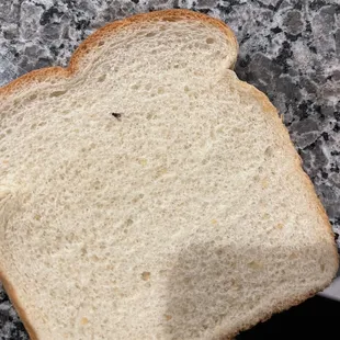 Little black net on the bread