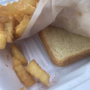 Bread under paper in fish box