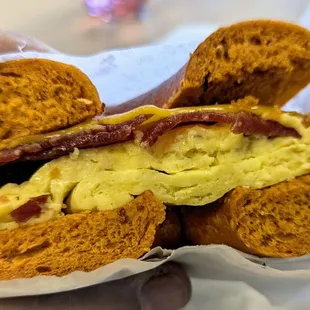 Bacon, egg and cheese on red chile bagel
