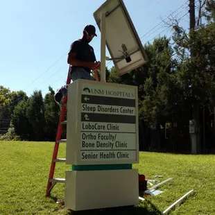 Power was not an option near the medical center so we fabricated a solar directional sign. Two years and no issues later.