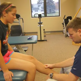 Ben assessing a patient's knee