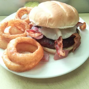 In the Fairway Burger with beer battered onion rings; just one of our four delicious specialty burgers!