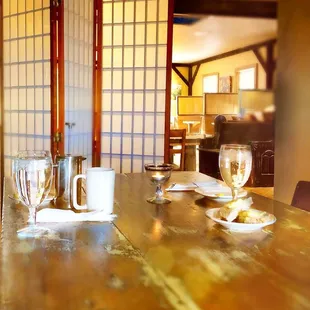 a wooden table and chairs