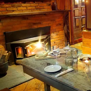 a wood burning fireplace in a restaurant
