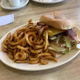 Bacon cheeseburger and curly Q fries