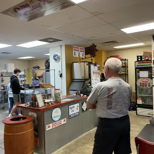 a man standing at the counter