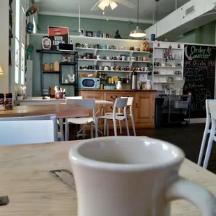 a coffee cup on a table