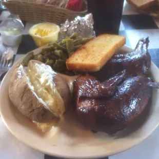 Smoked chicken, baked potato, green beans, and beer bread. Absolutely delicious! I can&apos;t believe I ate the whole thing