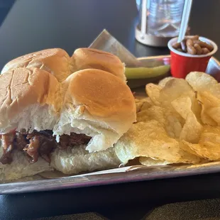 Bbq sandwich with chips and beans