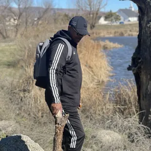 Hubby with a piece of fallen tree