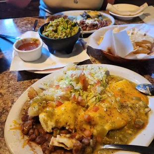 Chicharrone burrito w green, quacamole and cheese quesadilla!