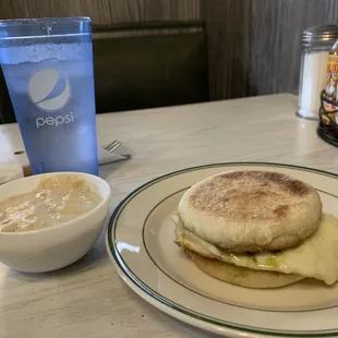 Small Pesto Egg Sandwich with a side of Sausage Gravy.