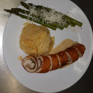 Chicken Roulade scalloped potatoes and asparagus - wing Wednesday Special