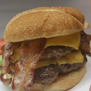 You can almost here is sizzle, the Double Bacon Cheeseburger. Burger blend is ground in house daily