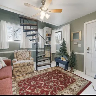 COTTAGE has a spiral staircase up to a king bed. Queen sleeper downstairs. Full kitchen and bathroom. Sleeps 4.