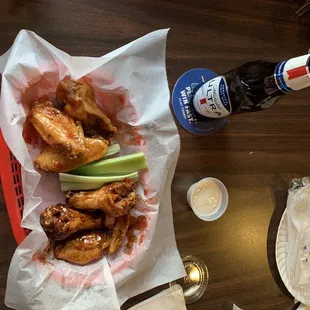 (Half eaten) wings as described in review