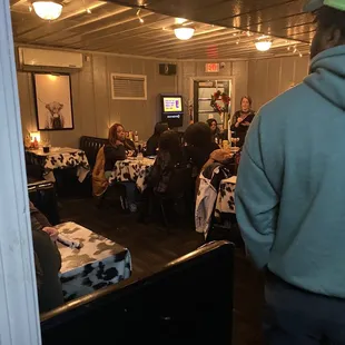 a man in a green hoodie