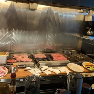 View from the bar.  Watch em cook!