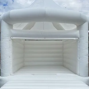 Closed top all white Luxury Bounce House