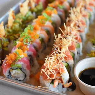 a tray of sushi rolls