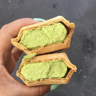 The Matcha Ice Cream inside the waffle cone with chocolate