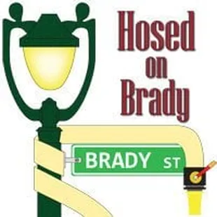 a street sign and a lamppost