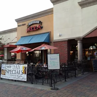 It's next to Top Class Pizza.